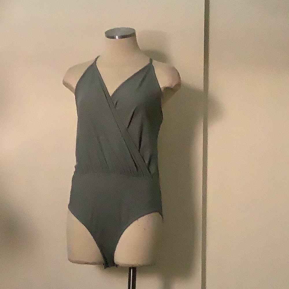 A blue body suit